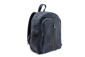 Quintana Vegetable-Tanned Leather Backpack in navy, angle