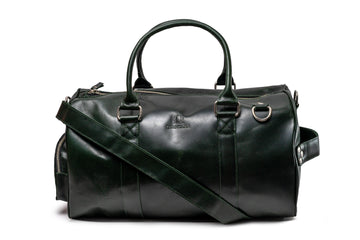 Quintana Vegetable-Tanned Leather Duffel Bag in dark green, angle with strap