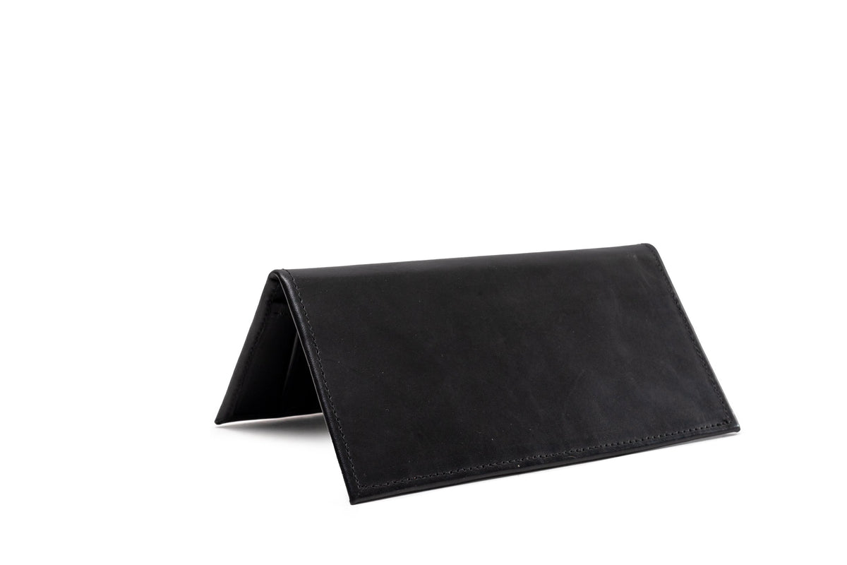 Quintana Leather Checkbook Carrier and Wallet in black, standing