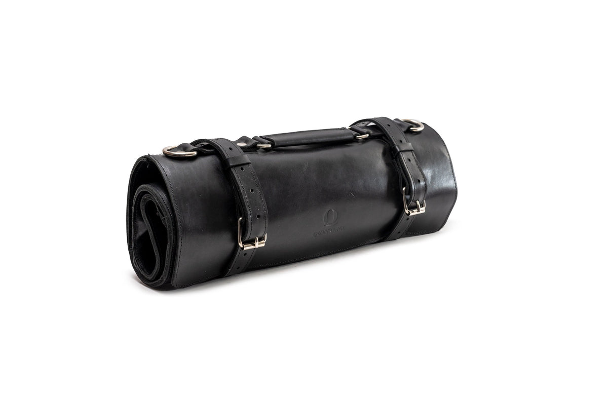 Quintana Leather Knife Roll in pull up black, rolled three-quarter view