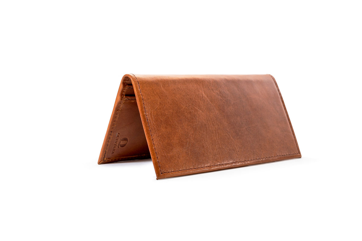 Quintana Leather Checkbook Carrier and Wallet in cognac, standing view